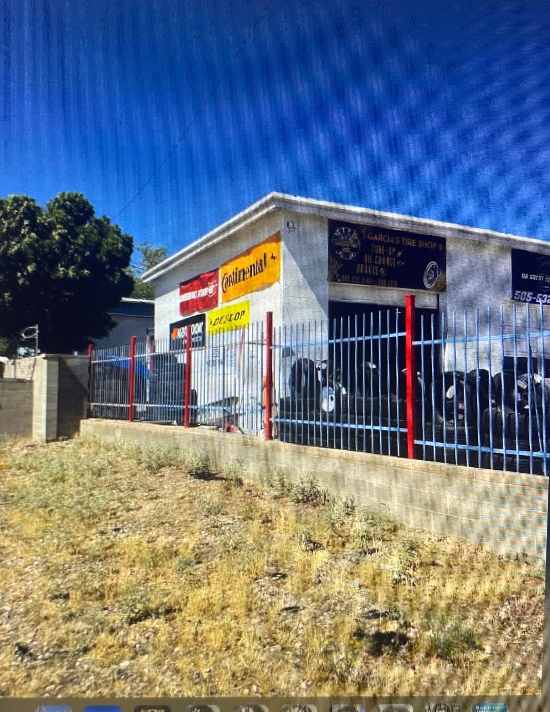 Garcia's Tire Shop storefront with brand banners