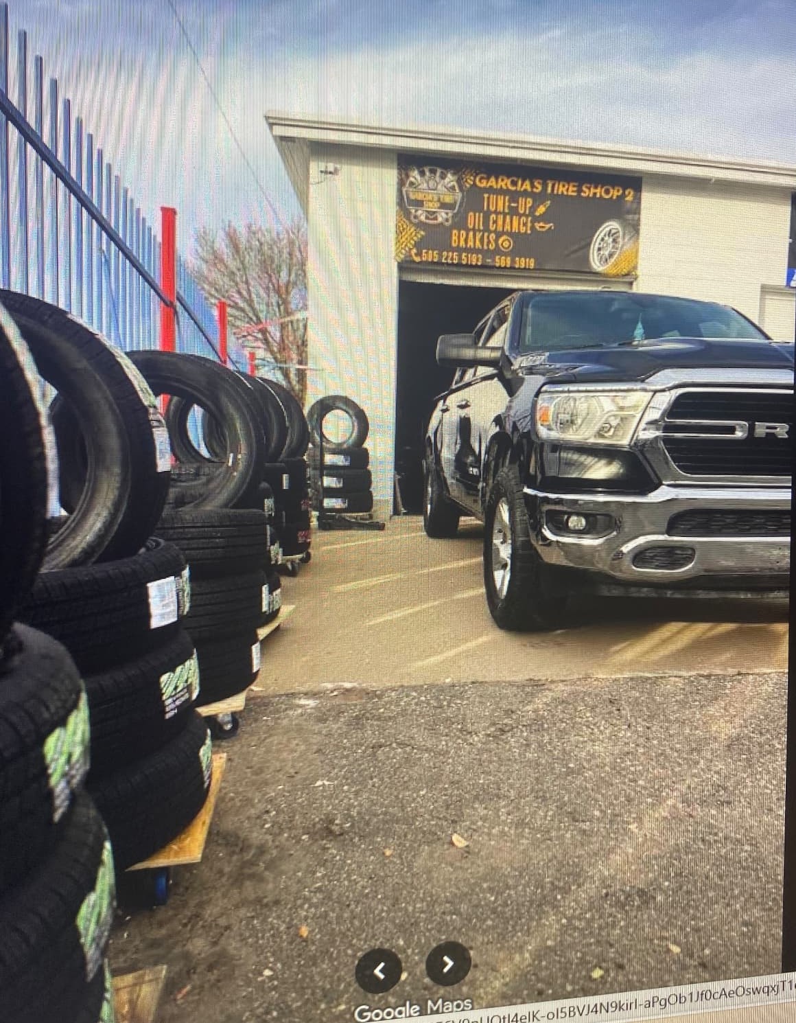 Truck parked at the Garcia's Tire Shop service bay